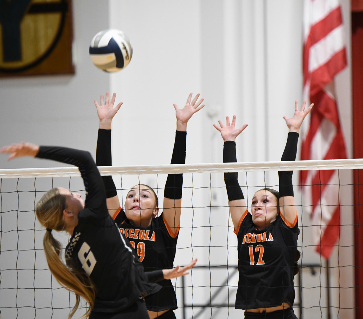 Graci Conkling and Alexis Burritt go for the block. PCN photo by Calvin Holtz.