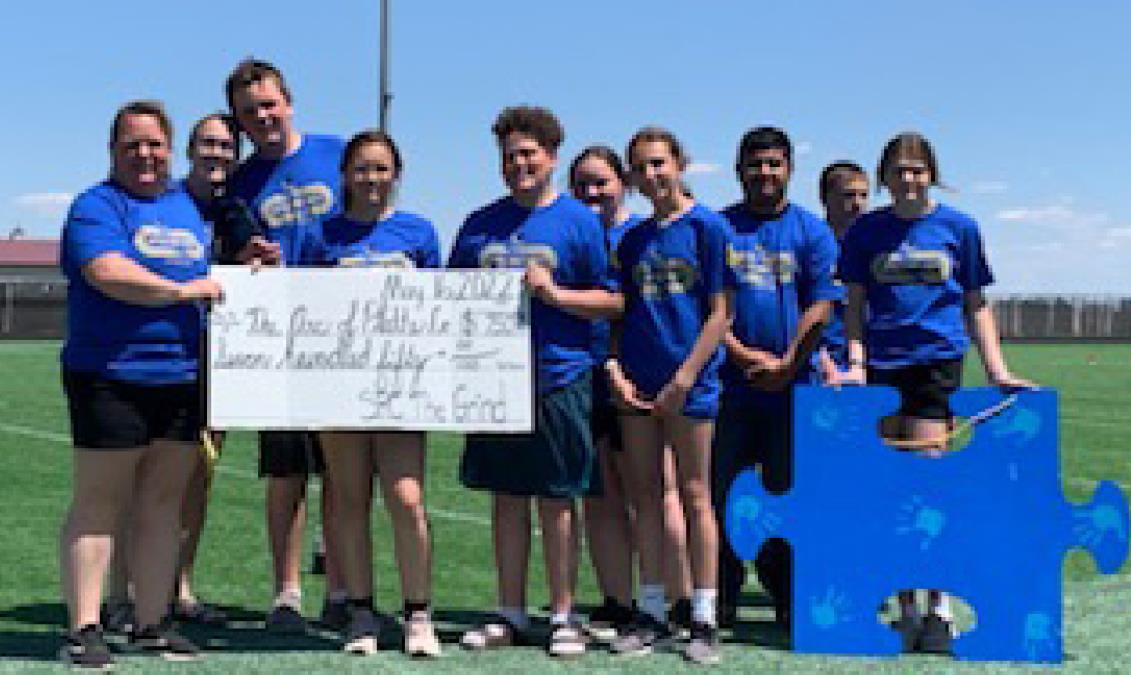 Summer Friends Special Needs Camp received $750 from the Shelby Rising City Grind which is a coffee shop run by the Special Education students at Shelby Rising City School.