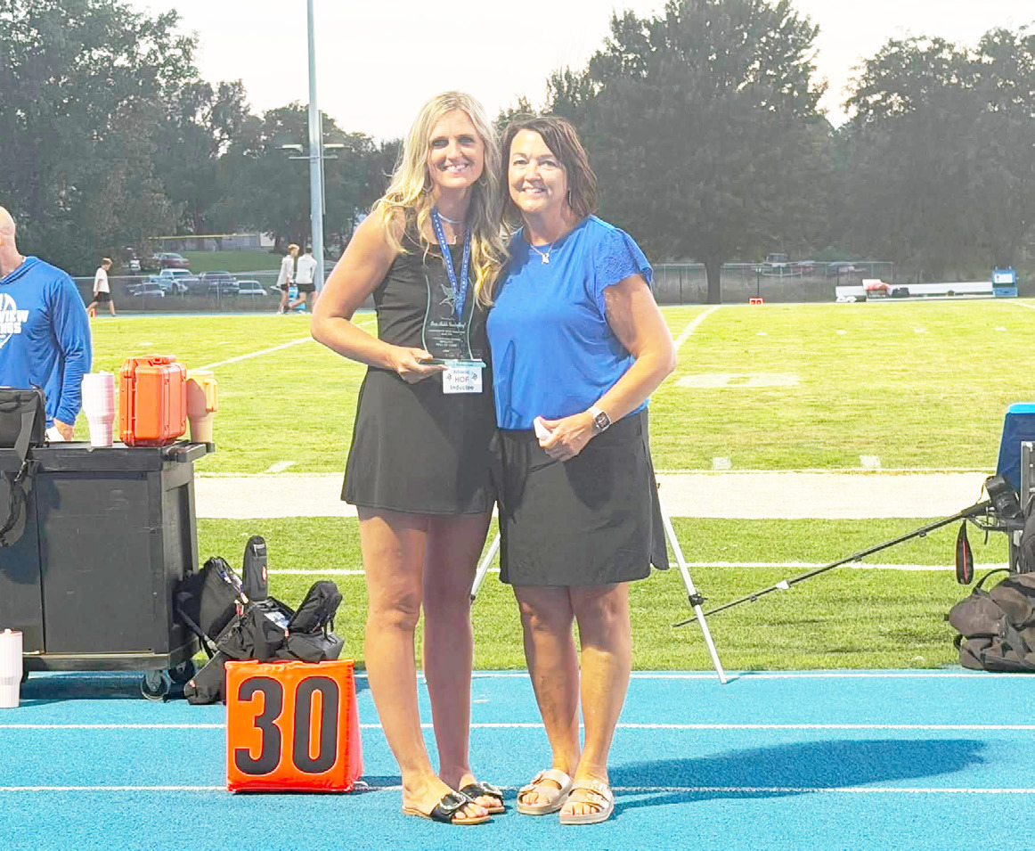 Brea Goodenkauf (left) was inducted into Columbus Lakeview’s athletic hall of fame for her volleyball playing, as well as basketball and track. Photo provided.