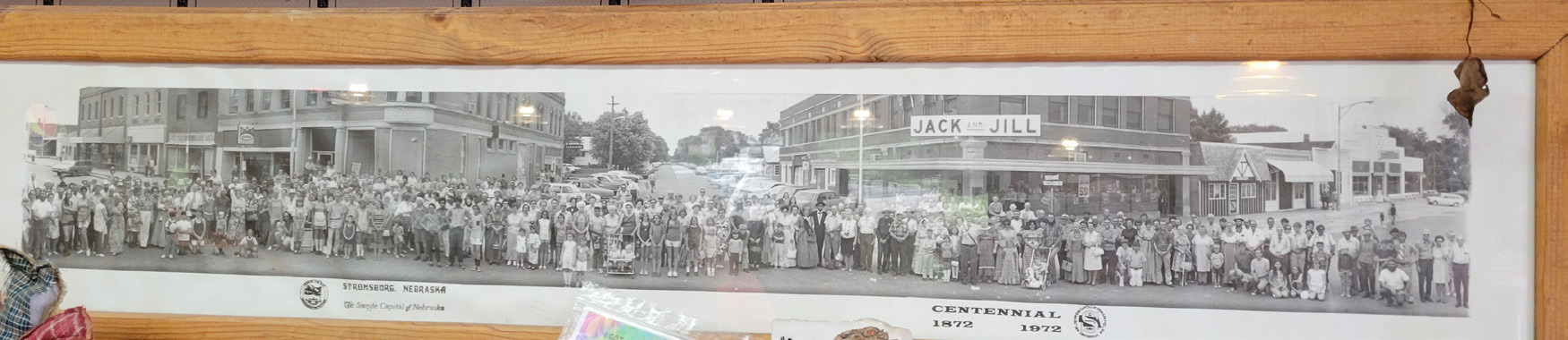 The whole community is invited on Sunday, September 4th at 1:30 p.m. when the city is taking a 150th anniversary photo. It will mark the occasion similar to how the city took a photo in 1972 for the centennial. This one hangs in Corner Cafe. Photo by Beth Sparrow.
