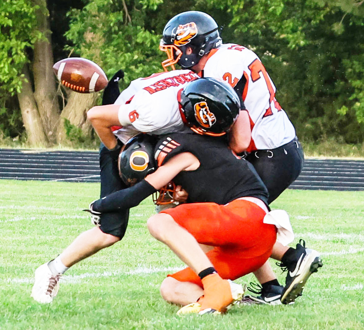 Osceola’s Landan Drozd seperates the ball from the Palmer kick-off return man and the ball is scooped up for an Osceola touchdown. PCN photo by Blaine Winslow.