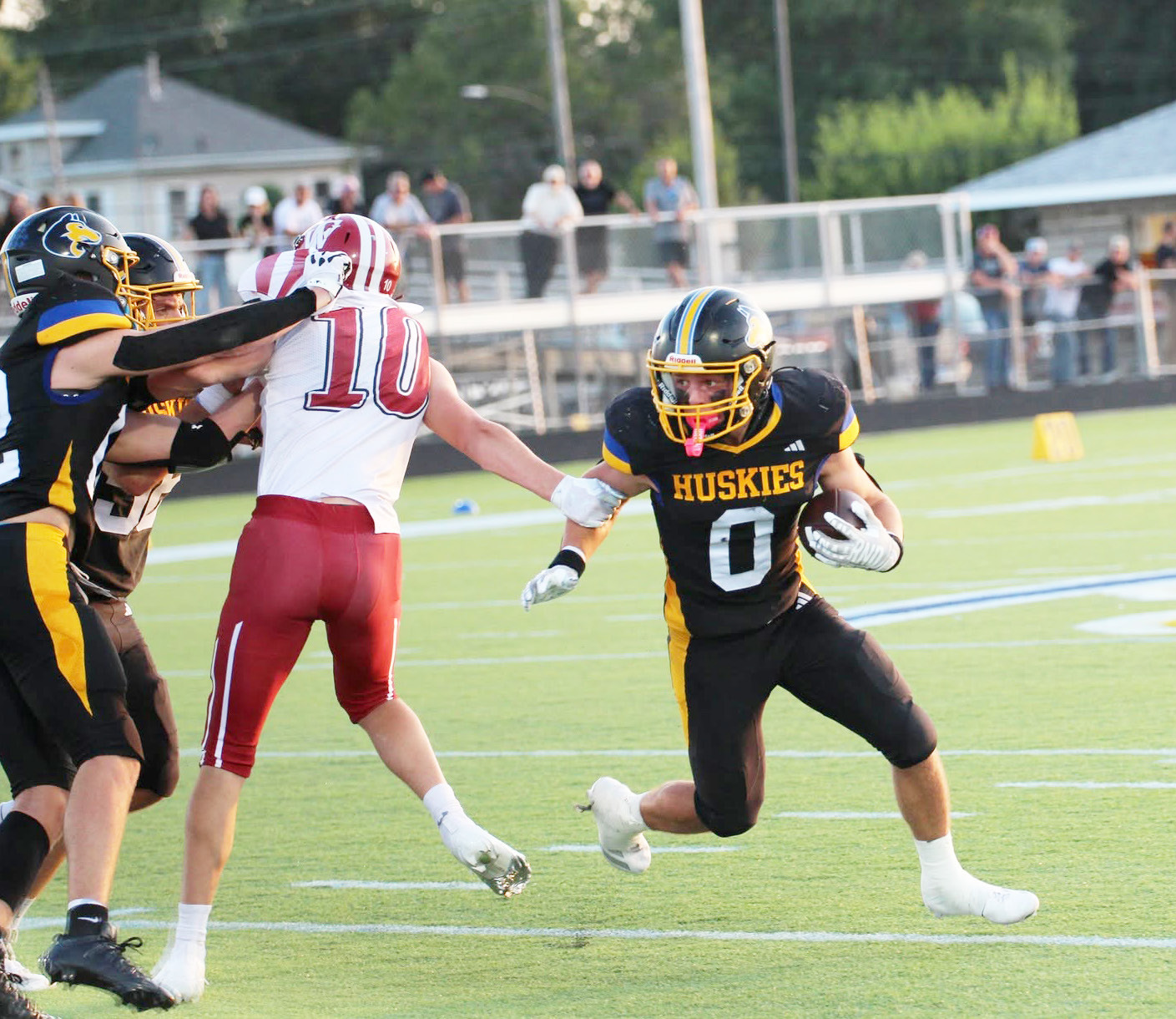 Senior Carter Eickmeier tries to turn the corner on the Fullerton defense in Friday night’s season opener in Shelby. Eickmeier ran for a team-high 93 yards on 17 carries in the team’s 42-6 win. PCN photo by Travis Lane.