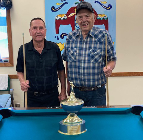 Top-Gary Bemis and Gary Glatter of Shelby successfully defended their June Polk County Pool Championship in July and will hold the title for another month. Photo provided.