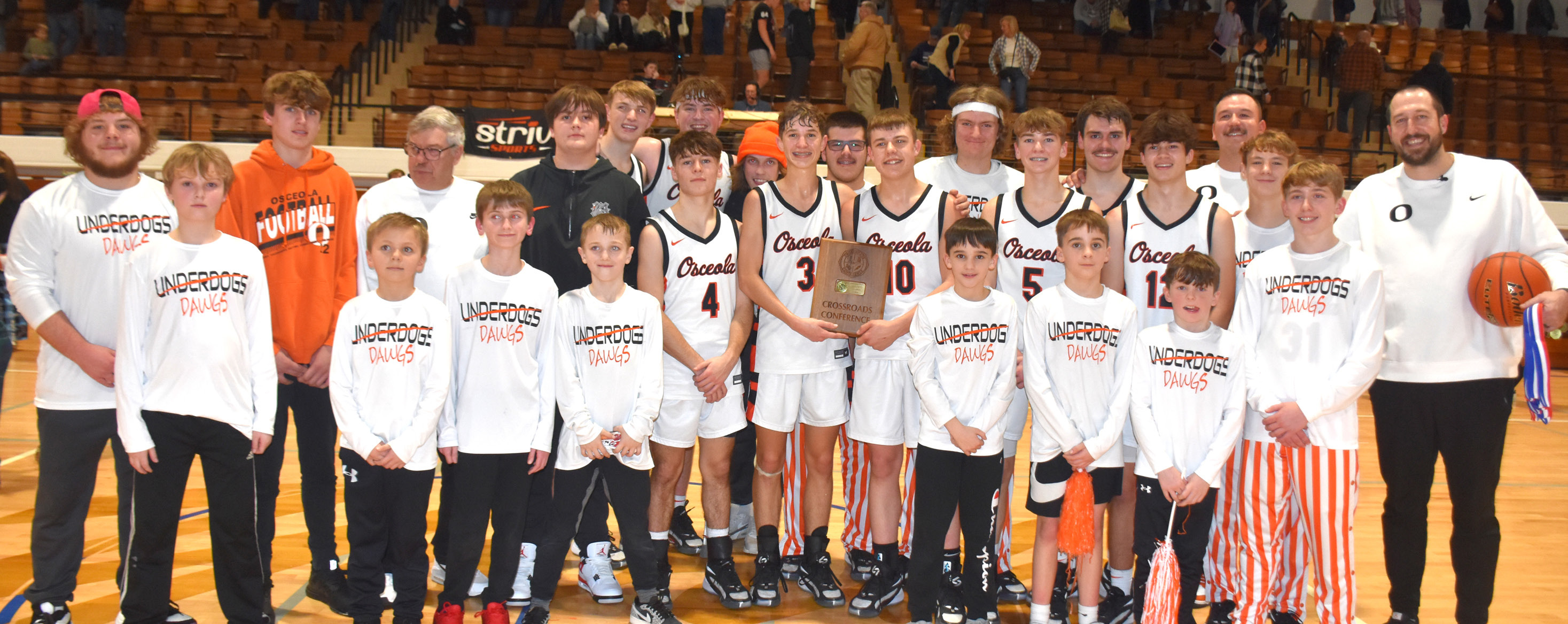 The Osceola Bulldogs repeat as Crossroads conference champions after a win over Cross County. PCN photo by Beth Sparrow. 