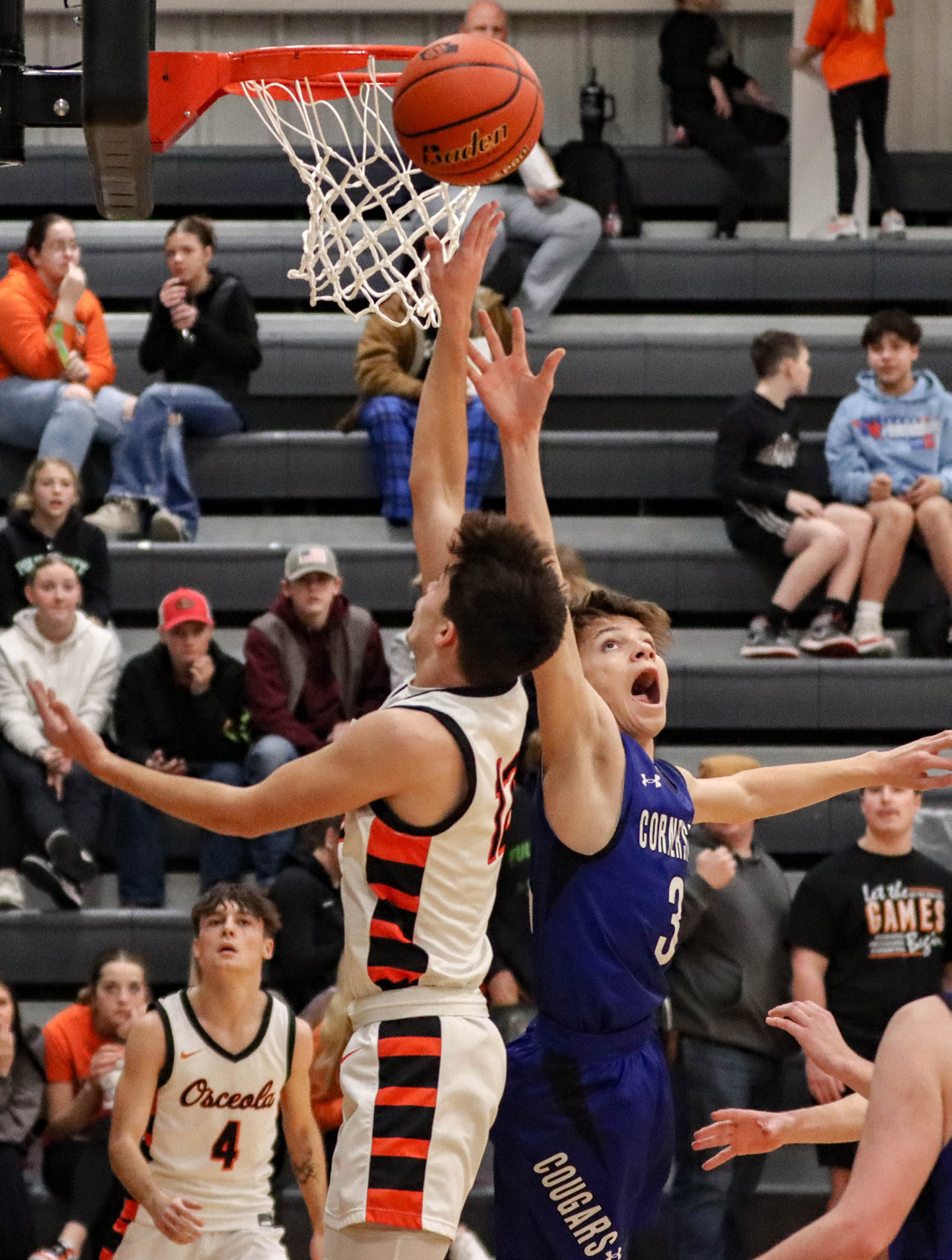 Jackson Winslow goes for the layup while a Cornerstone Christian defender tries to stop him. PCN photo by Blaine Winslow.