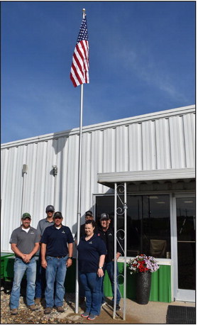 The Osceola Legion Auxiliary recognizes a business and family for faithfully flying the flag. This year’s recipients were AKRS Equipment (above) and Craig and Roxanne Page (below). PCN photos by Beth Sparrow.