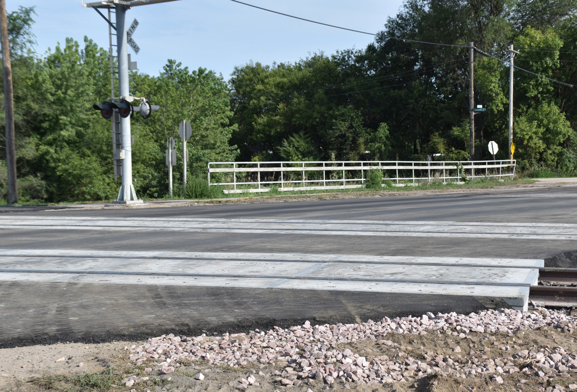 Stromsburg residents and other travelers are happy the railroad crossing work was done early. It was finished by Saturday afternoon. It is very smooth now. Detour signs were still up on the weekend but should be removed. PCN photo by Beth Sparrow.