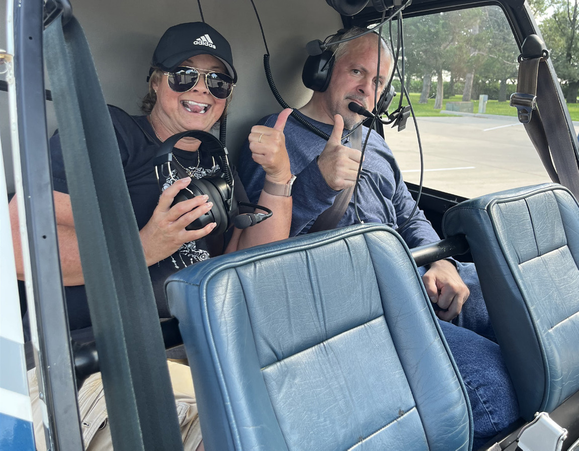 Steve Duranchinsky (right) and a family member prepare to go on a helicopter ride this past Sunday from the Midwest Covenant Home. Photo was provided.
