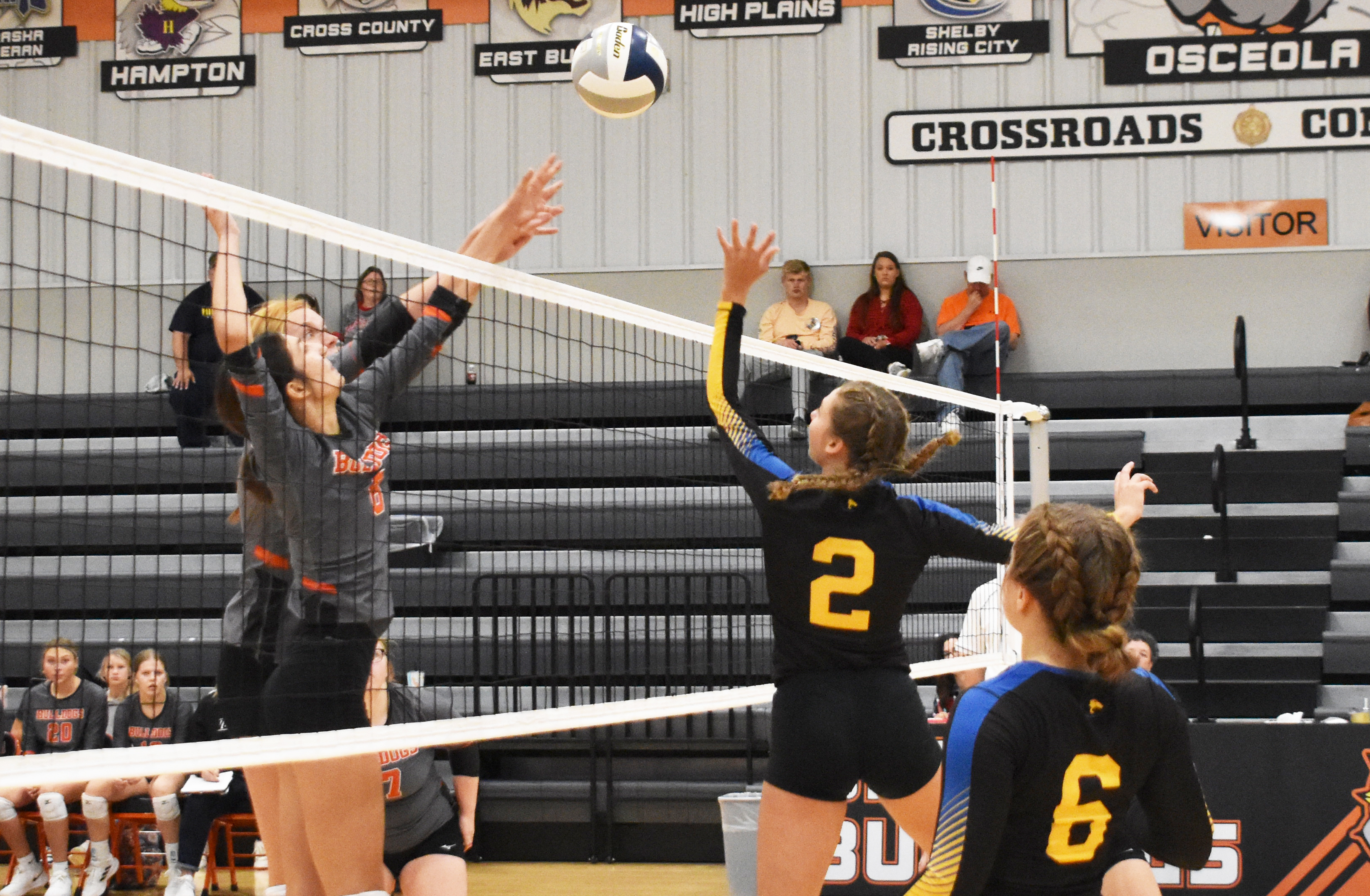 Shelby-Rising City’s Liberty Baker (No. 2) tips the ball over the net against Osceola on Saturday at the Osceola Invite. PCN photo by Beth Sparrow