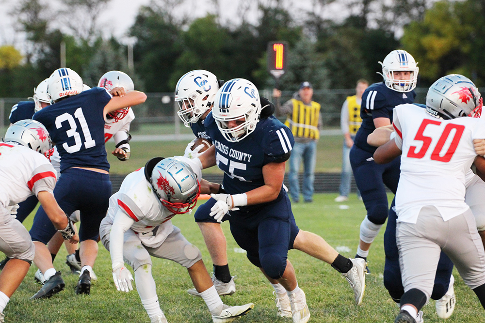 Alex Noyd opens a hole for the offense to run through. PCN photo by Travis Lane