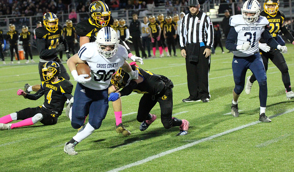 Izaac Dickey rushed for 255 yards and six touchdowns as the Cougars completed the undefeated regular season with a win over the Huskies. PCN photo by Travis Lane