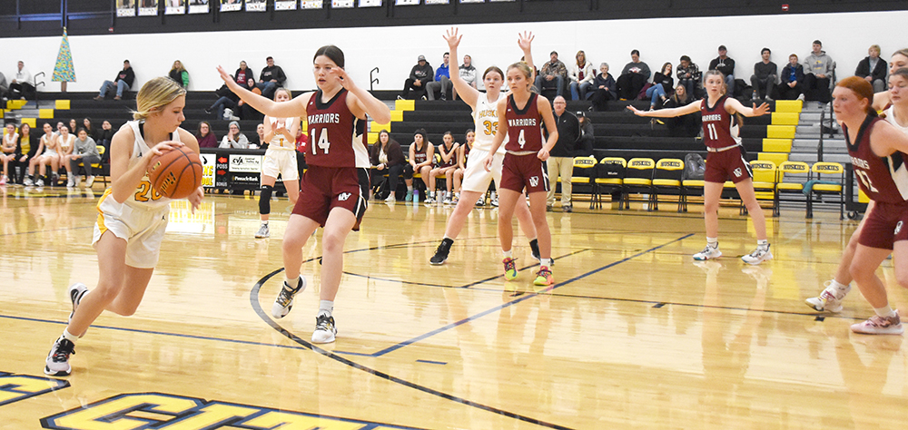 Danica Watts looks to drive past the Fullerton defender in the opening round of the SRC Holiday Tournament on Wednesday. PCN photo by Beth Sparrow