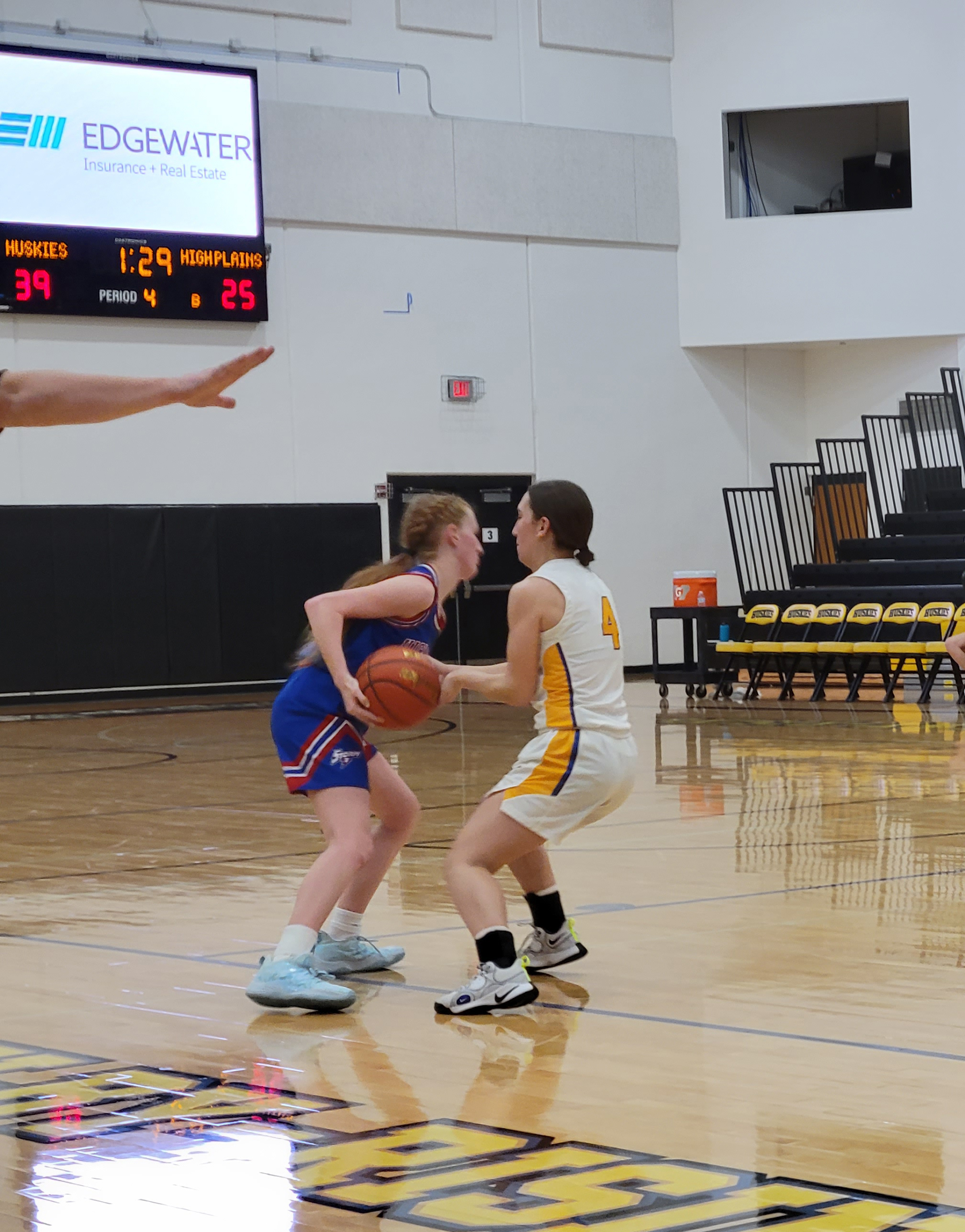 Peyton Hofmann tries to get around Angel Barnes. 
