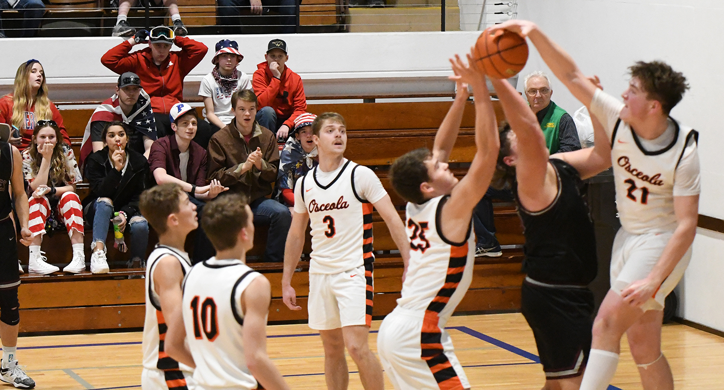 Kale Gustafson blocks a BDS shot during the second half on Thursday. PCN photo by Rick Holtz