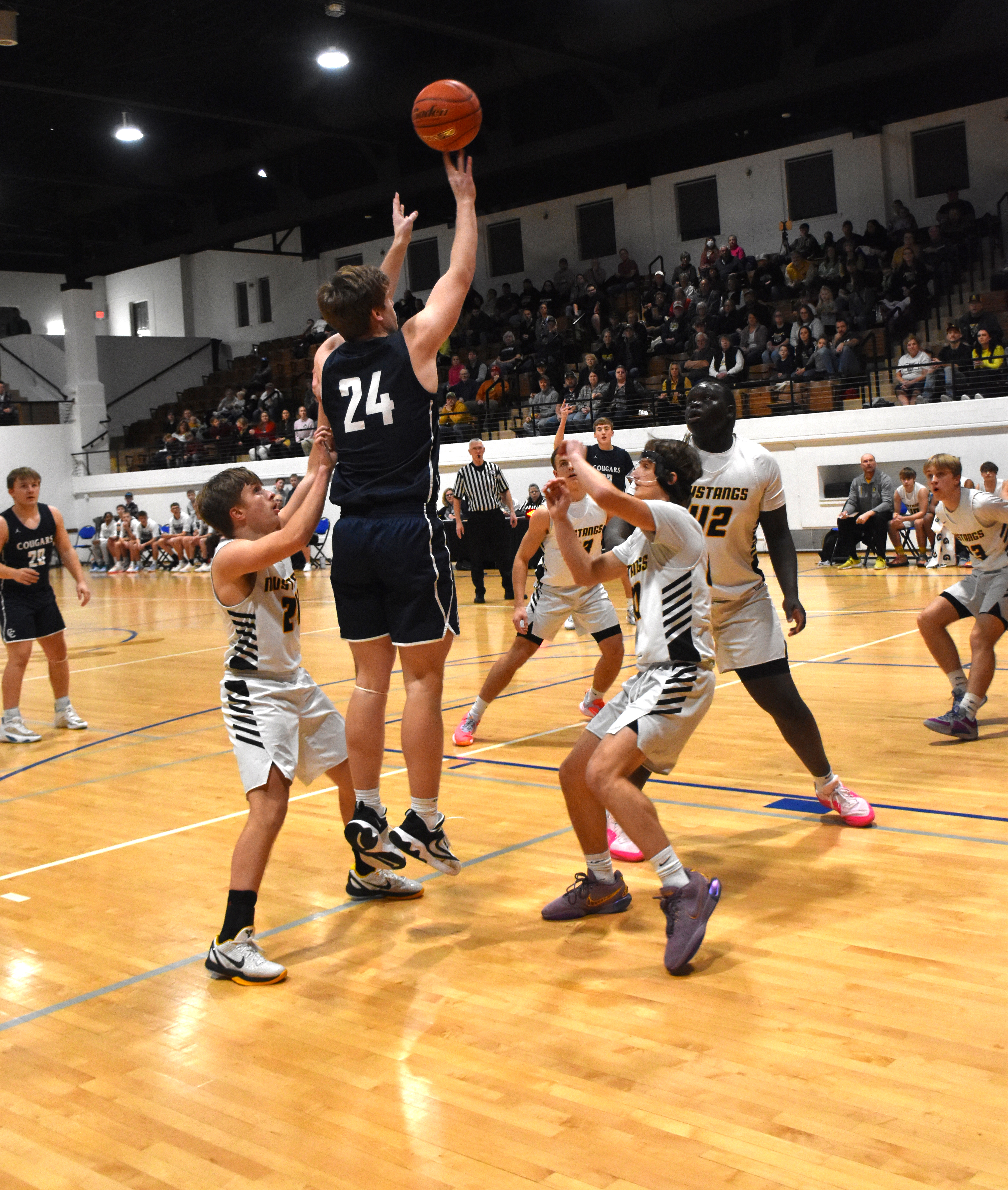 Langdon Arbuck takes a shot against McCool.
