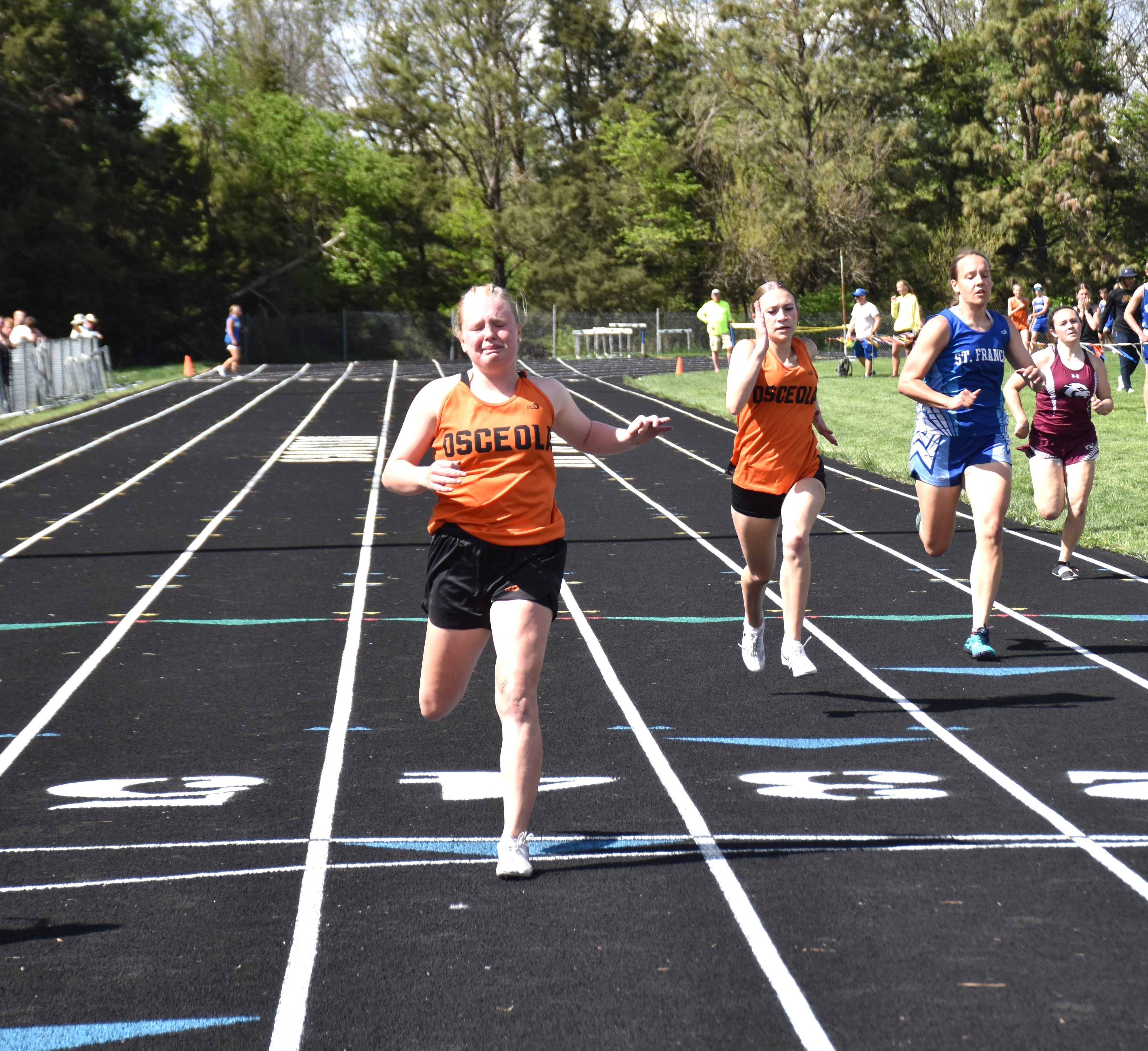 The disappointment of third place: Janna Roberts (OSC) was in tears coming in third as that meant no automatic qualification for state. PCN photo by Beth Sparrow.
