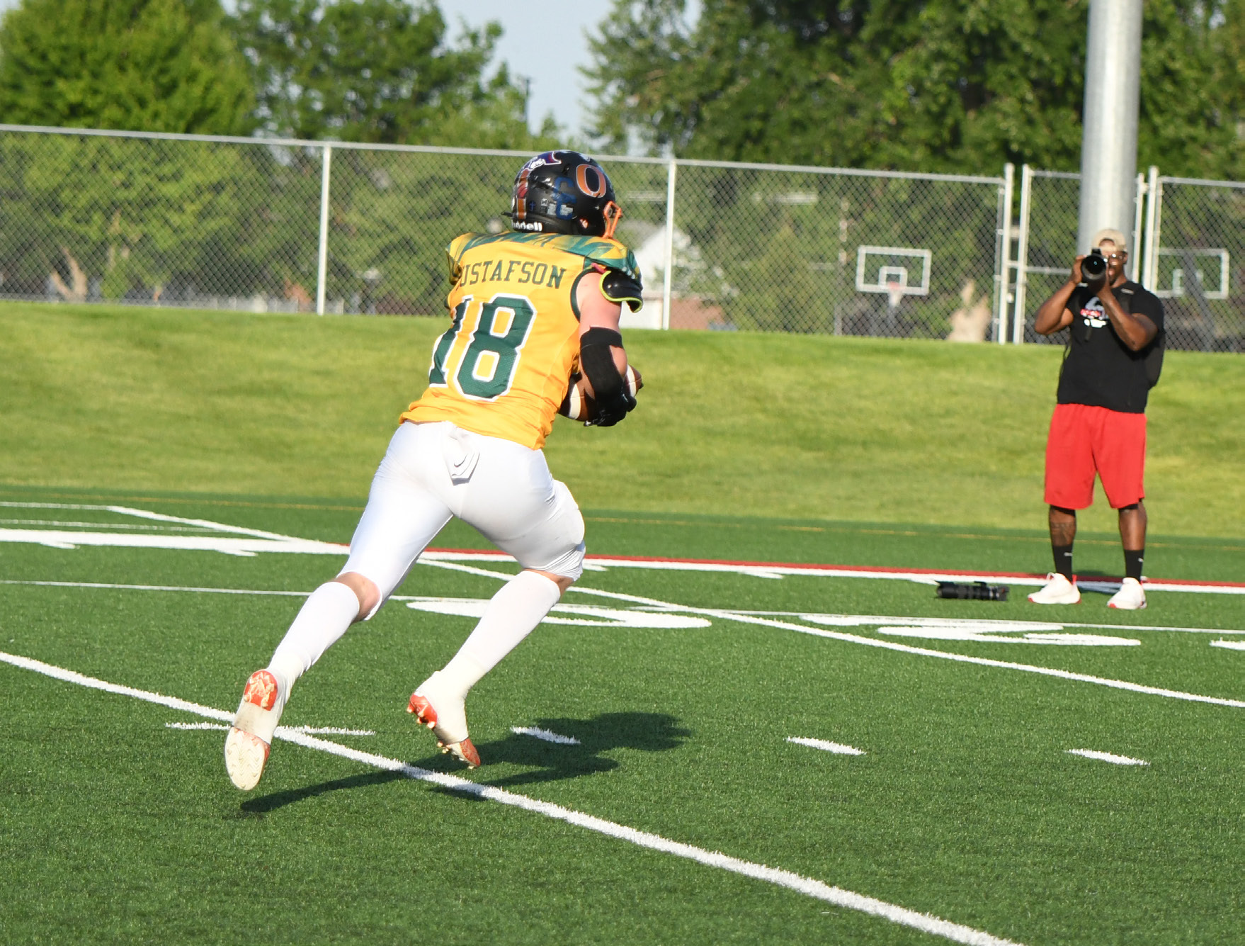 Kale Gustafson runs it in for a touchdown for the East team at the Sertoma 8-man all star game. PCN photo by Rick Holtz