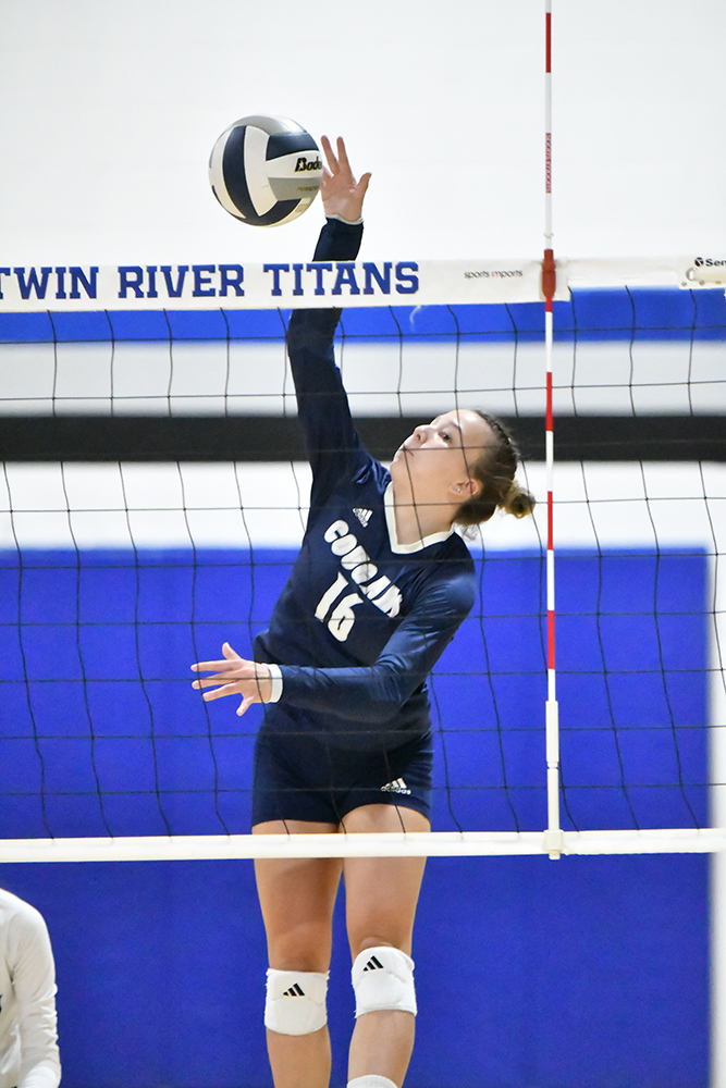 Ava Pruter gets a kill at the Twin River triangular. PCN photo by Rick Holtz