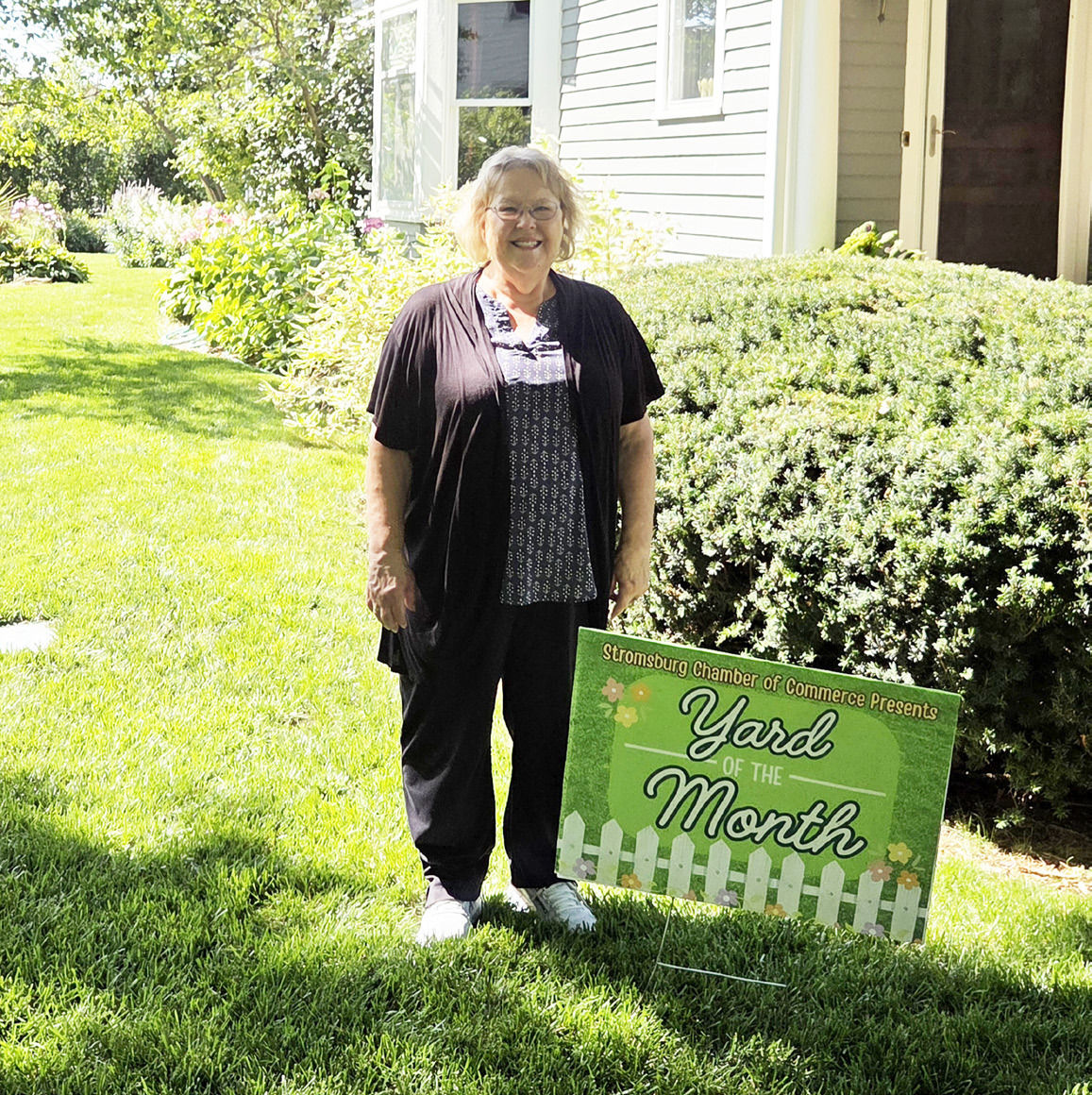 Helen Werth is the August winner of the Yard of the Month. Shortly after Jerry’s passing last year, Helen came home to their yard completely destroyed by army worms. With the help of Negley’s Complete Lawn Care her yard was brought back to life! Helen’s yard is also surrounded by the most beautiful flower garden. Each variety of flower in her garden seems to have a story with it. Helen’s Grandson Ian helps her keep it tidy by mowing. Congrats to Helen! Photo was provided.