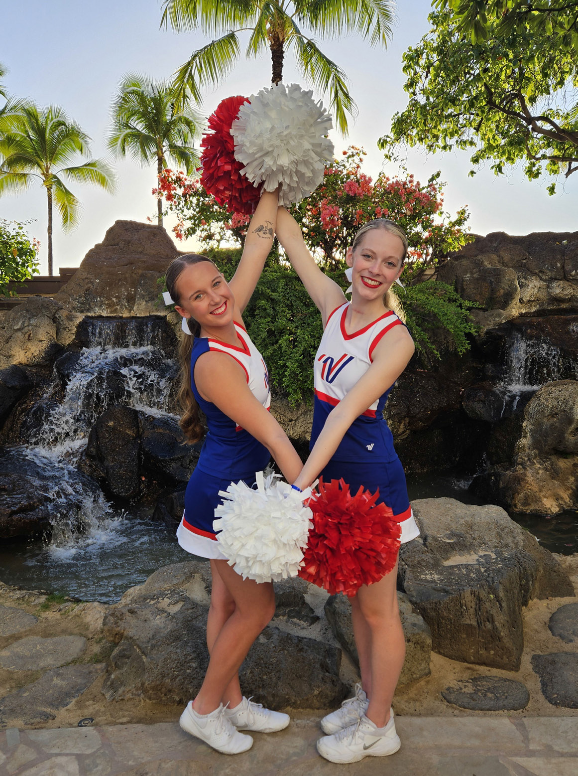 Senior dance/cheer members Kaylei Perry (left) and Ellie Frederick (right) went to Hawaii for the Pearl Harbor Parade. Photos provided.