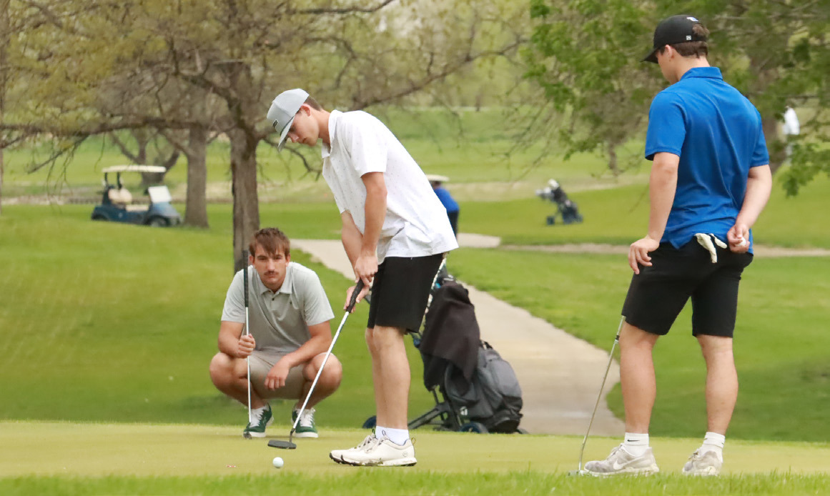 Shelby-RC’s Jaxon Carter strikes his putt on the 14th hole at Quail Run on Thursday during the Scotus Central Catholic Invite Carter led the Huskies as he fired a 47 on the front side and a 43 on the back. PCN photo by Ken Kush.