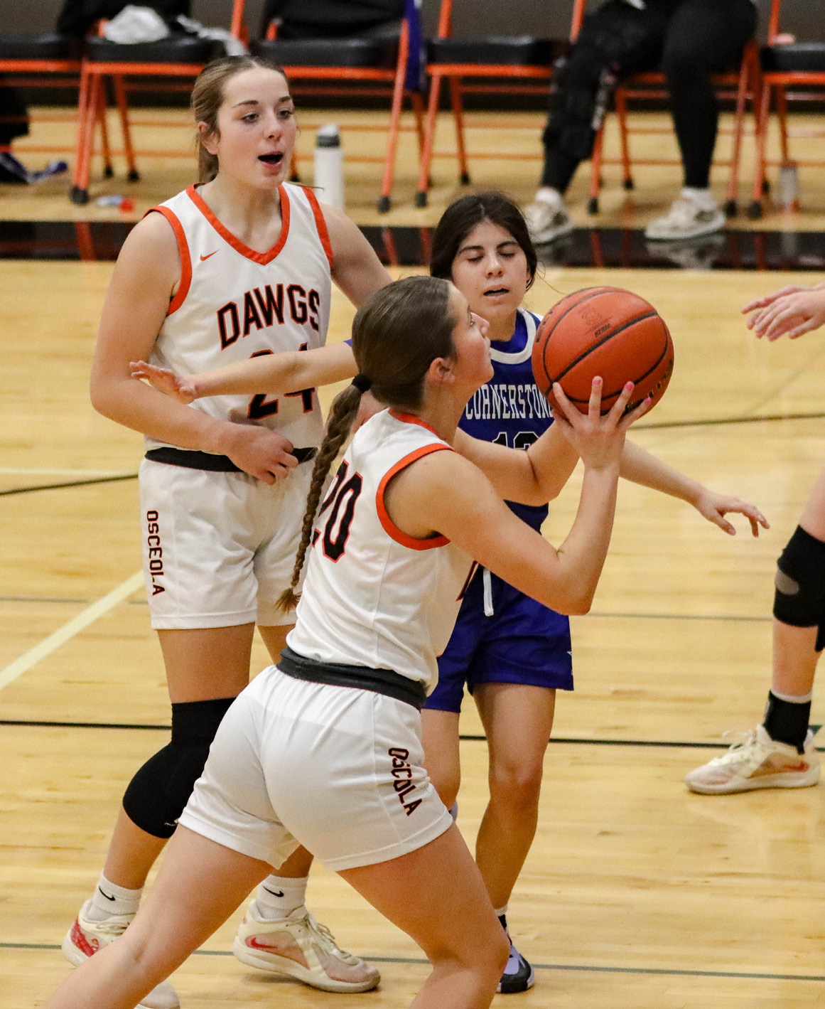 Halle Gabel takes a shot with Bella Recker in the background. PCN photo by Blaine Winslow.