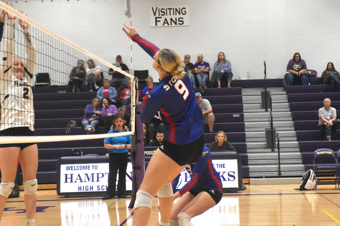 Going into Saturday’s tournament in Hampton, HallieJo Urkoski had registered 16 kills in the team’s first four games of the week. Here she is on the attack against the Lawrence-Nelson Raiders defense. PCN photo by Beth Sparrow