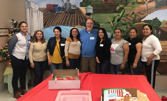 Pictured above are members of the ELL class who have been learning English in an after-school program with their younger students. Below: They had a party after completing their 10-week term. Photos provided.