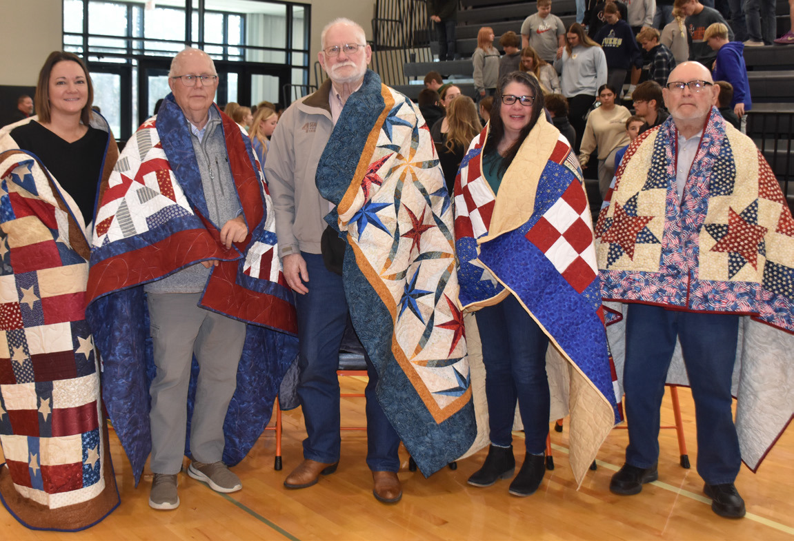 Above: Osceola had 5 quilts of valor presented on Veterans’ Day. Pictured are Amanda Hinkle, Dale Fjell, Michael Anderson, Lisa Goodell and James Langer. PCN photo by Beth Sparrow.