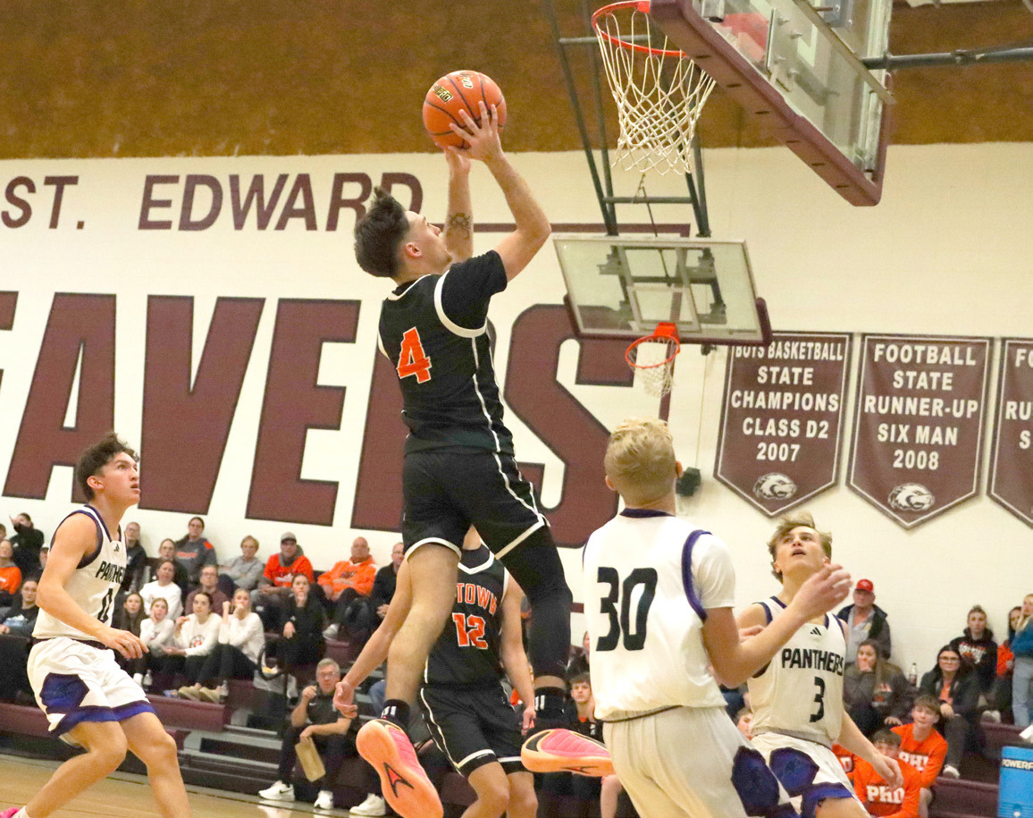 Osceola senior Brayden Santos goes for a basket against NG/ SE. PCN photo by Blaine Winslow.