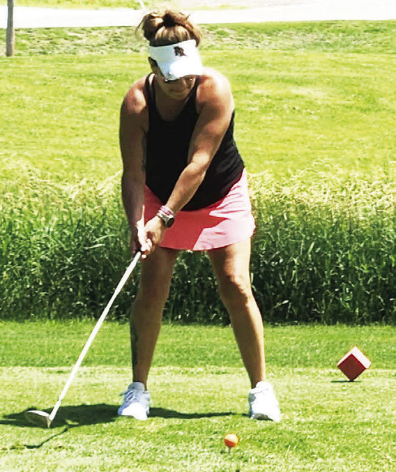 The 2026 Midwest Covenant Home Golf Tournament was held at Ryan Hill Golf Course this past Friday. The format were four-person teams, best ball, playing 18-holes of golf. Left- Shelly Urkoski tees off during the tournament. Photo provided by Craig Pinley.