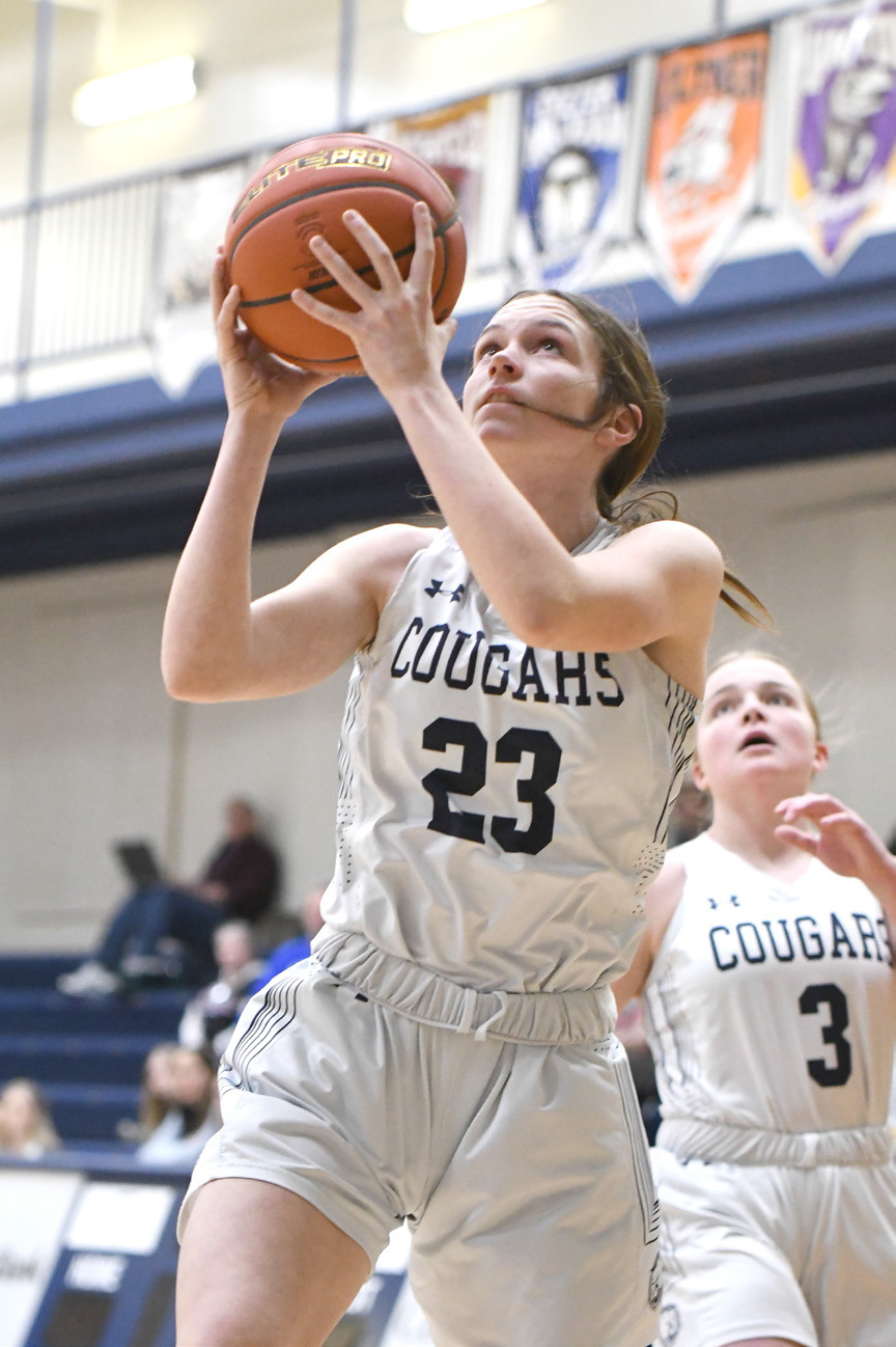Lindee Kelley goes in for a layup for Cross County. PCN photos by Rick Holtz