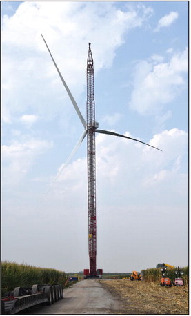 As you may have noticed, Prairie Winds, the 2.3 mW wind turbine southwest of Osceola, hasn’t been operating for the last month. This was due to a pitch bearing for one of the blades that had failed. Over the next week, the repairs will be made by lowering the blades to the ground, replacing the bad bearings, and then reinstalling the blades. PCRPPD buys the output from this wind turbine but does not own and is not responsible for this unit’s repairs and maintenance. PCN photo by Beth Sparrow.
