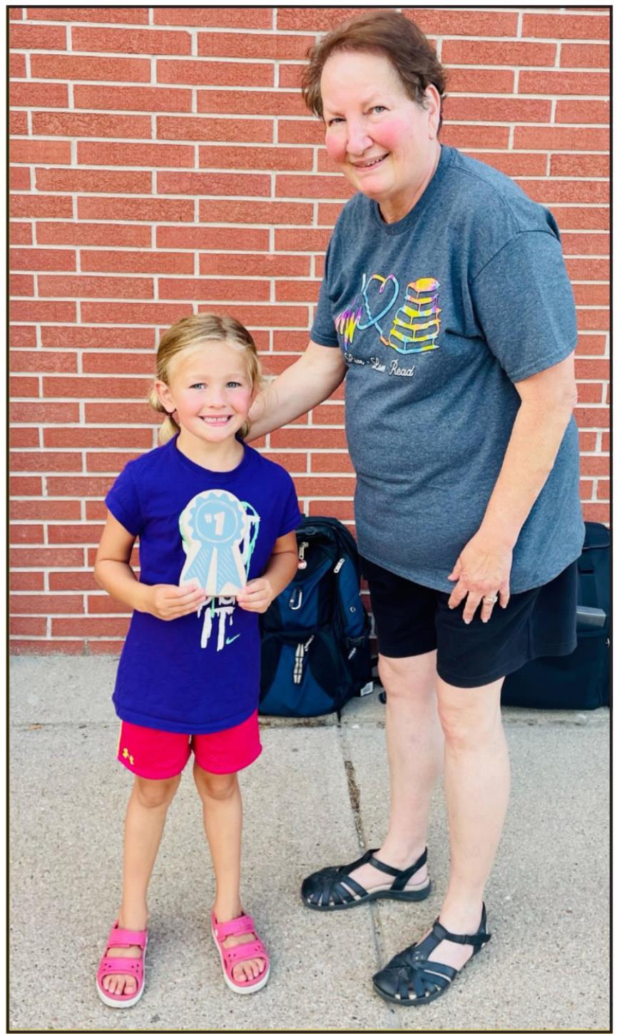 Cora Stewart was top reader for Pre-K and Kindergarten, pictured left with Library Director Laura Alt. 
