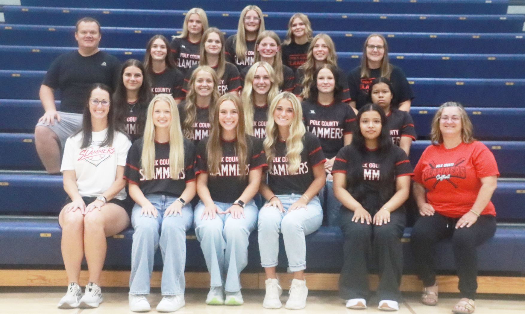 Members of the Polk County/Aquinas Slammers softball team include front row (L-R); head coach Angie Schroetlin, Kelsey Brehm, Brooklyn Banholzer, Jordyn Vandenberg, Jazlyn Ramirez-Catalan, coach Carrie Swanson. Row 2-Misty Noble, Olive Peterson, Faith Samek, MaCadden Turner, Dulce Ramirez-Catalan. Third row- coach Roy Emory, Audrey Gardner, Madelyn Emory, Jadelynn Gifford, Chloe Schott, coach Kim Baloun. Top row- Makenna Fuhrman, Kyndall Boruch, SM KK Baloun. PCN photo by Ken Kush.