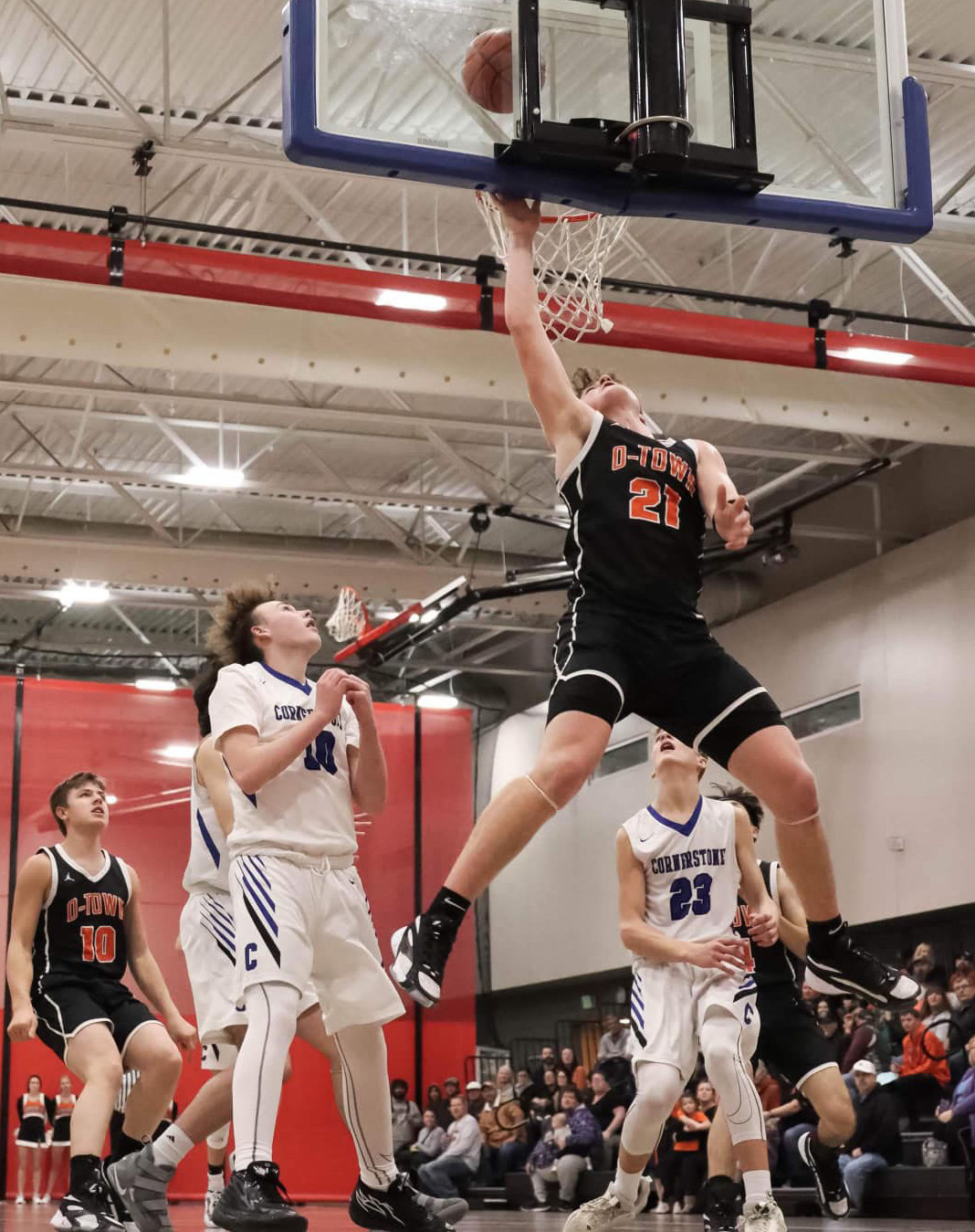 Above: Kale Gustafson goes up for the dunk against Cornerstone Christian. PCN photo by Blaine Winslow.