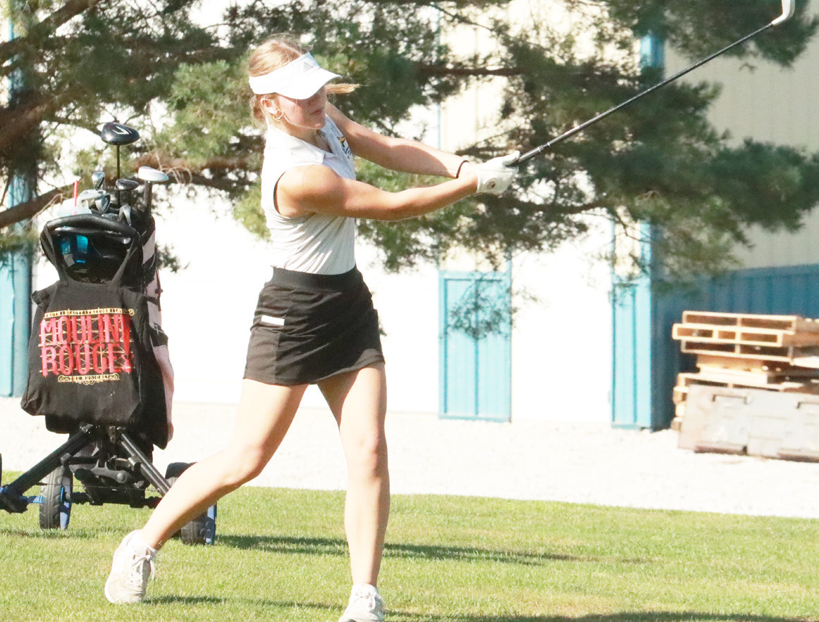 Shelby-RC’s Charlotte Slusarski hits her appraoch shot to the No. 6 green and Fox Hollow last Thursday during the Sutton Invite. Slusarksi finished with a 120. PCN photo by Ken Kush.