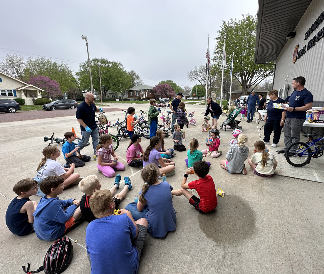 Children learned about bike safety and won prizes at the Bike Rodeo in Stromsburg on Saturday. PCN photo by Rick Holtz.