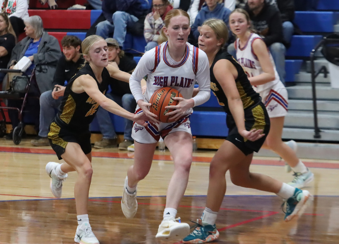High Plains senior Peyton Hofmann drives right through the teeth of the McCool Junction defense in last Thursday night’s game in Polk. PCN photo by Ken Kush.