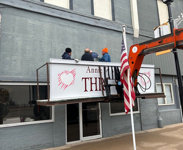 The Annie Jeffrey Thrift Shop is moving across the street and the sign recently moved with the help of Hays Construction, Larry and his hospital crew. Photo provided.