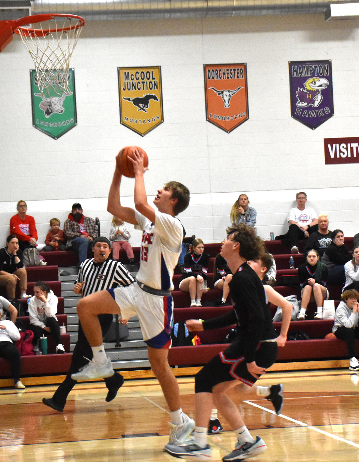 Carter Urkoski goes for the layup against Cedar Bluffs. PCN photo by Beth Sparrow.