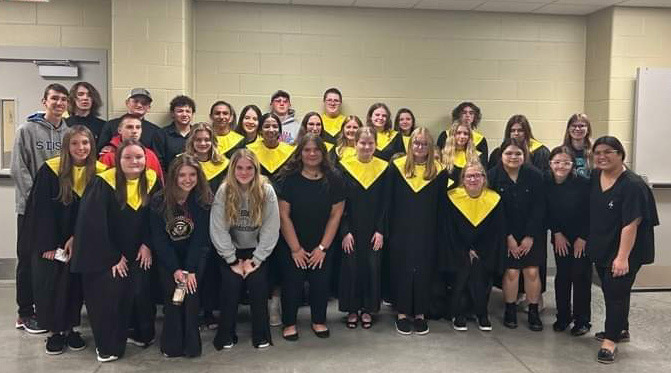 The Shelby-Rising City Band and Choir (above) both received Excellent Ratings (II) at District Music Contest in Columbus on April 21st. Choir soloist, Briauna Rathje (below left), received a Superior Rating (I), and soloist Caydee Bauers received an Excellent Rating (II). S-RC music director is Jamaica Lomenario. Photos provided.