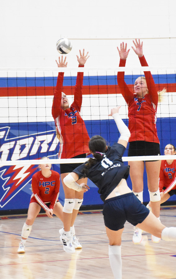 The Nebraska Christian attack is being defended by the Storm’s Josie Spurling (3) and Taya Hans (7) in Thursday’s Play for Payton game at High Plains. PCN photo by Beth Sparrow.