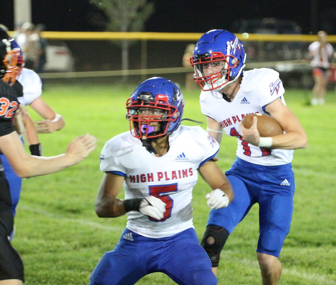 Gavin Morris carries the ball while Raul Marino blocks for him. PCN photo by Travis Lane.