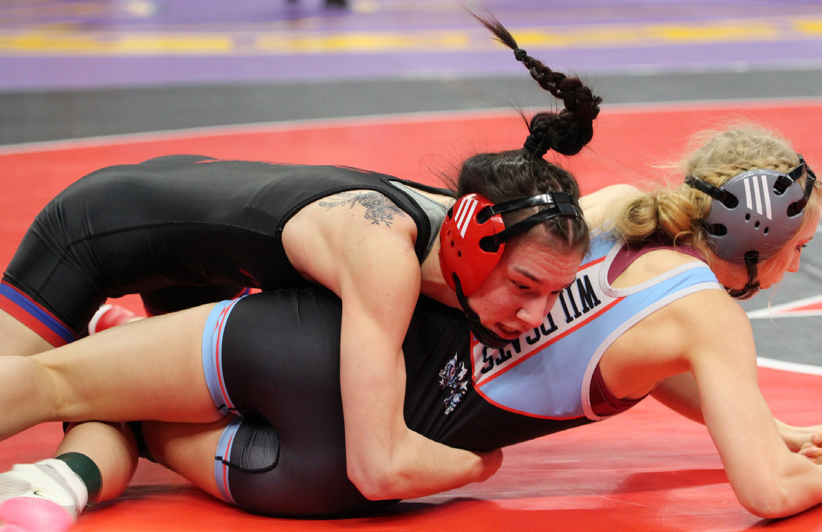 Dakota Gress (HPC) wrestles at state. She placed fourth. PCN photo by Travis Lane.