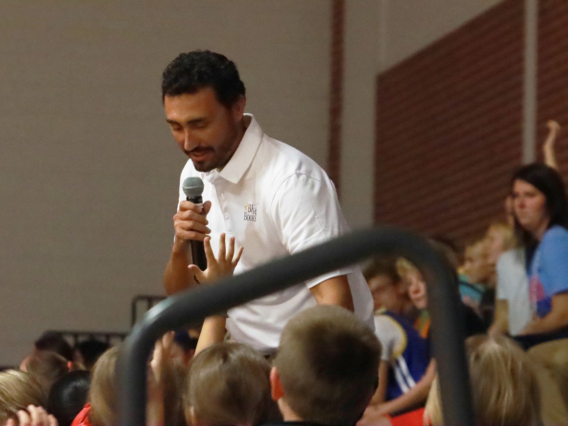 Children’s Author Brody Kelley talks with the students at High Plains Elementary in Clarks last Tuesday. Kelley talked about how when he was young he would create his own books and even shared some of his illustrations with the students. Kelley is a teacher in Albion. PCN photo by Ken Kush.