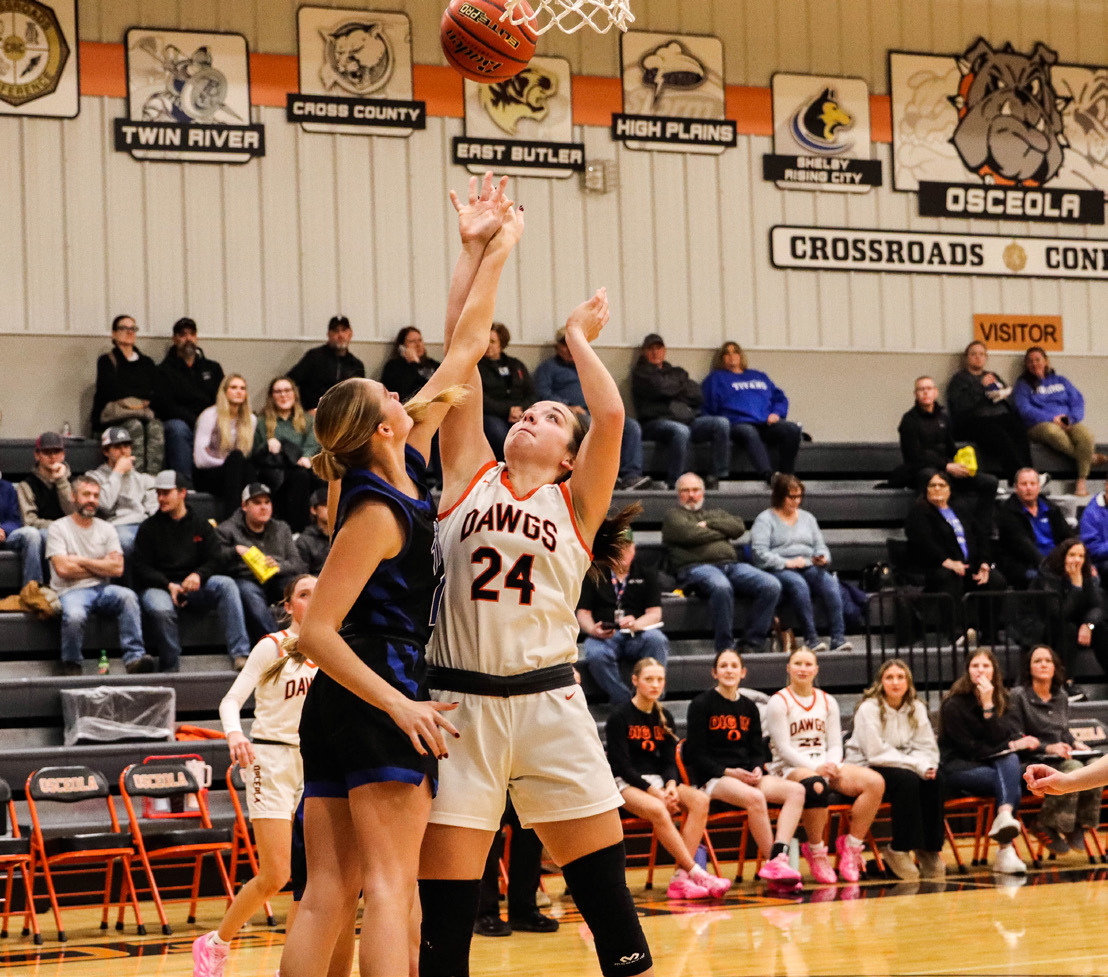 Osceola junior Bella Recker (24) put the Bulldogs on her back on Saturday, scoring 26 points and leading the Bulldogs to the 50-45 win over Twin River. PCN photo by Blaine Winslow