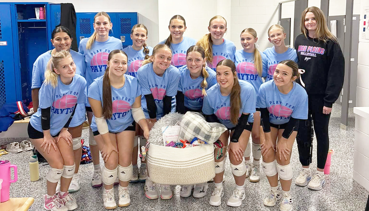 The Palmer volleyball team presented the High Plains volleyball team pet products for Payton Ackerson’s Paws for Payton. Photo was provided