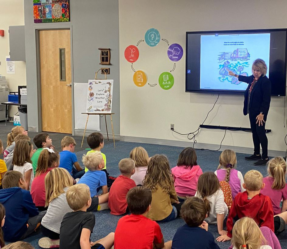 Stromsburg alumni Jan Jones came to Cross County School to promote her book 'Let's Explore Weather Lore' with author Sandra Hanson. Students enjoyed hearing about the book, how to find weather, and how animals react to it. Jones and Hanson were middle school teachers in Kearney. Their book is available from Amazon.com, Barnes and Noble and The Solid Rock in Kearney. Photo provided by Cross County School.