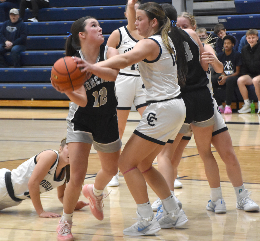 Cross County senior Ella Clark locks down on defense against the EMF offensive player last Thursday night. PCN photo by Beth Sparrow.